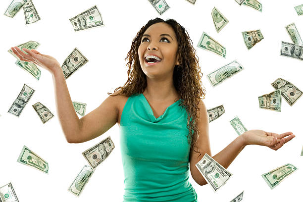 HappiTravel Full Review - Stock image of woman standing with open arms amidst falling money