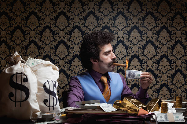 Travel Gig Full Update - Man lighting up a cigar with US dollar bill,